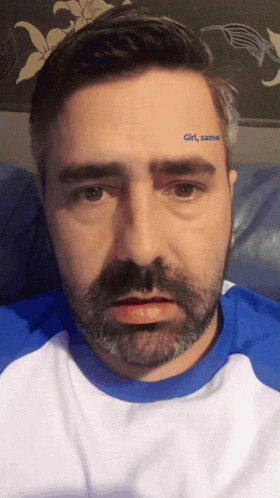 A Man With A Tattoo On His Forehead That Reads Girl Same GIF