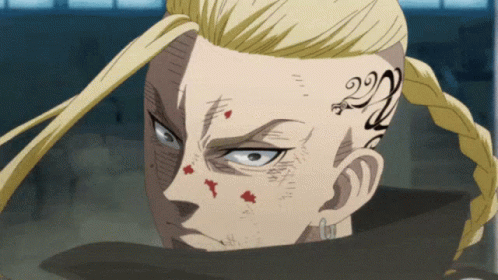 A Man With A Tattoo On His Forehead That Says ' 22 ' GIF