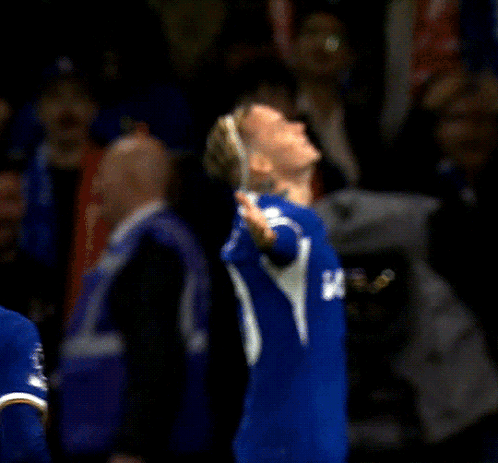 A Man With A Tattoo On His Neck Is Wearing A Blue Jersey With The Letter I On It GIF