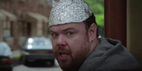 A Man With A Tin Foil Hat On His Head GIF