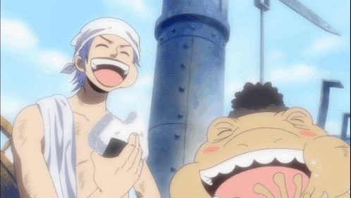 A Man With A Towel Around His Head Is Laughing Next To A Frog GIF