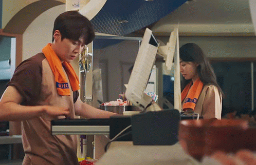 A Man With A Towel Around His Neck That Says ' Nbc ' On It GIF