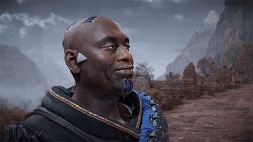 A Man With A Triangle On His Forehead Is Smiling In A Video Game GIF