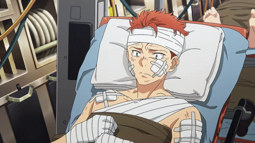A Man With Bandages On His Head And Face Is Laying In A Hospital Bed GIF