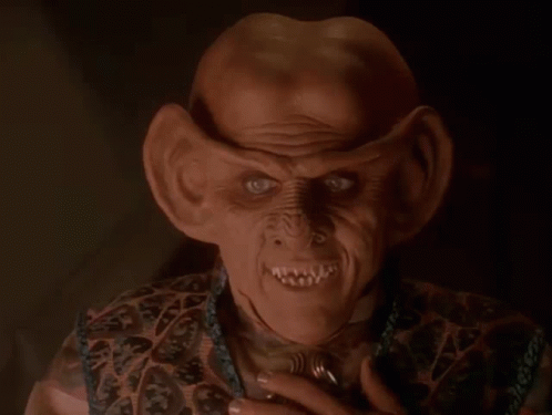 A Man With Big Ears And The Words It 'S Fifty-Fifty GIF