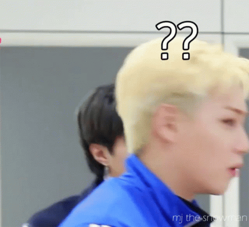 A Man With Blonde Hair Has Two Question Marks On His Head GIF