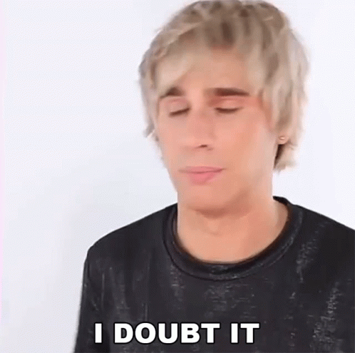 A Man With Blonde Hair Is Wearing A Black Shirt And Making A Funny Face . GIF