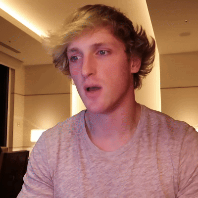 A Man With Blonde Hair Is Wearing A Gray Shirt GIF
