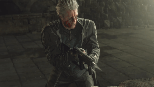 A Man With Blood On His Face Is Holding A Gun In His Hand GIF