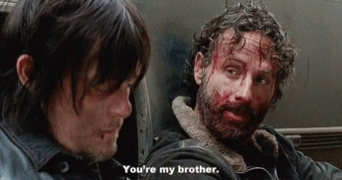 A Man With Blood On His Face Is Talking To Another Man Who Says You 'Re My Brother GIF