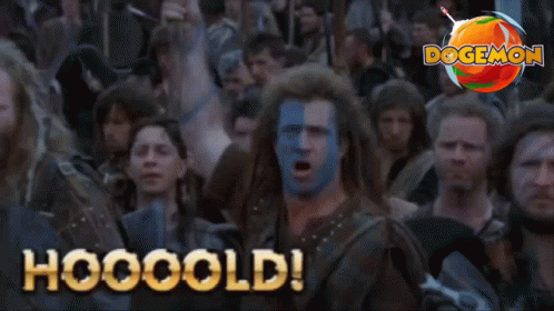 A Man With Blue And White Paint On His Face Says Hooooold In Front Of A Crowd Of People GIF