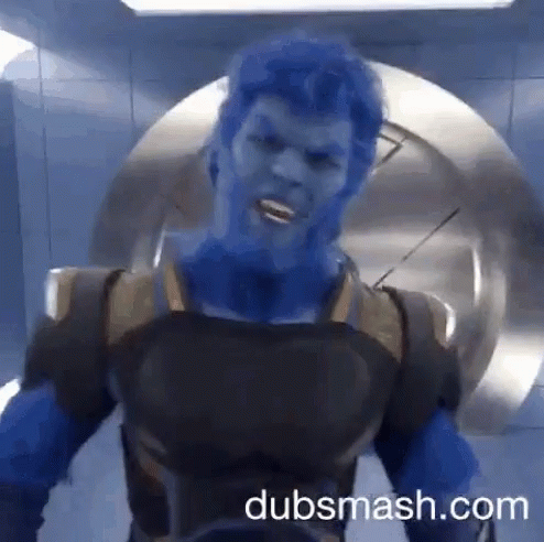 A Man With Blue Hair Is Standing In Front Of A Door With Dubsmash.com On The Bottom GIF