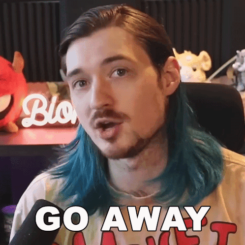 A Man With Blue Hair Says Go Away GIF