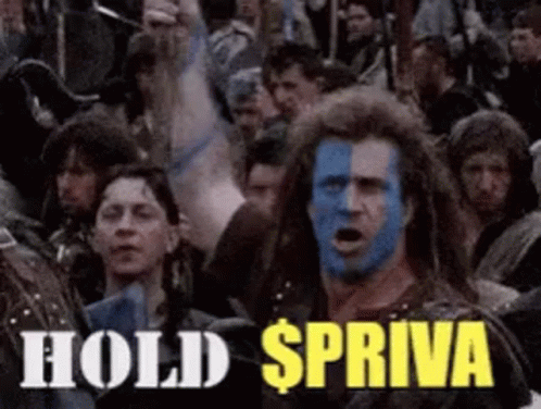 A Man With Blue Paint On His Face Is Standing In Front Of A Crowd And Says Hold Spriva GIF
