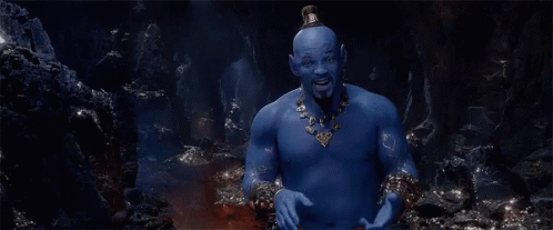 A Man With Blue Skin Is Sitting In A Cave . GIF