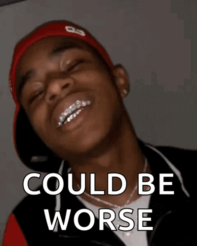 A Man With Braces On His Teeth Is Smiling With The Words " Could Be Worse " Below Him GIF