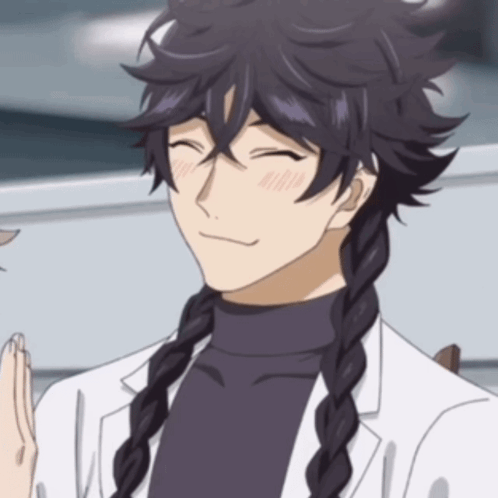 A Man With Braided Hair Is Wearing A White Coat And Black Turtleneck GIF