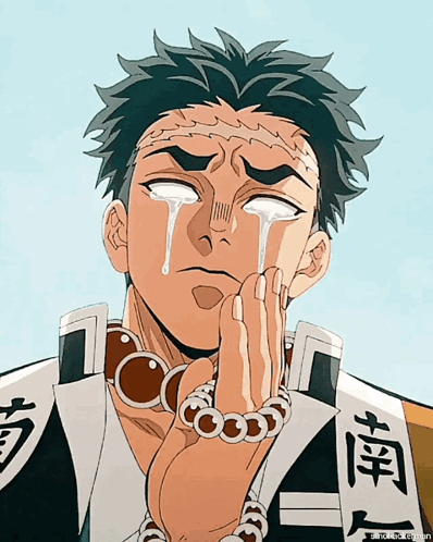 A Man With Chinese Writing On His Shirt Is Crying With Tears Running Down His Face GIF