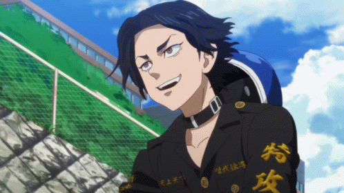 A Man With Chinese Writing On His Sleeves Is Smiling GIF