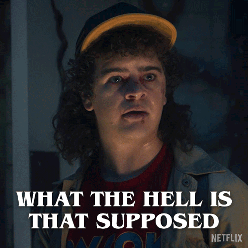 A Man With Curly Hair And A Hat Says What The Hell Is That Supposed GIF