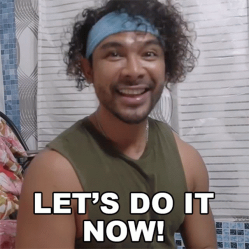 Man With Curly Hair And Headband Says Lets Do It Now GIF