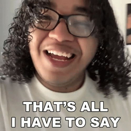 A Man With Curly Hair And Glasses Is Smiling And Says That 'S All I Have To Say GIF