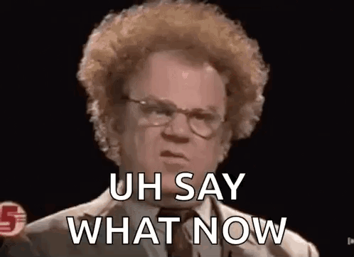 Man With Curly Hair And Glasses Talking About What Now GIF