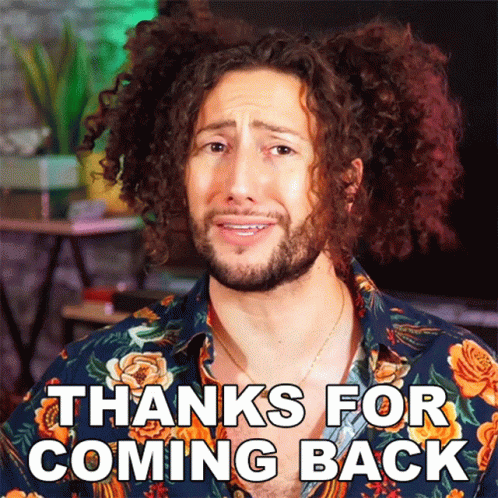 A Man With Curly Hair Is Wearing A Floral Shirt That Says Thanks For Coming Back GIF