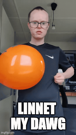 A Man With Down Syndrome Is Holding An Orange Balloon And Says " Linnet My Dawg " On The Bottom GIF