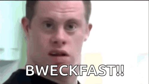 A Man With Down Syndrome Is Making A Funny Face And Says Bweckfast ! GIF