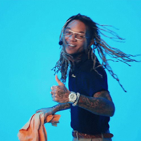 A Man With Dreadlocks Giving A Thumbs Up Sign GIF