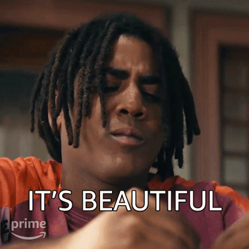 A Man With Dreadlocks Has The Words " It 'S Beautiful " Written On His Face GIF