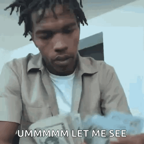 A Man With Dreadlocks Is Holding A Bunch Of Money And Says `` Ummmmm Let Me See '' . GIF