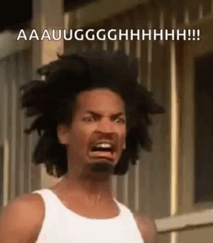 A Man With Dreadlocks Is Making A Funny Face With His Mouth Open . GIF