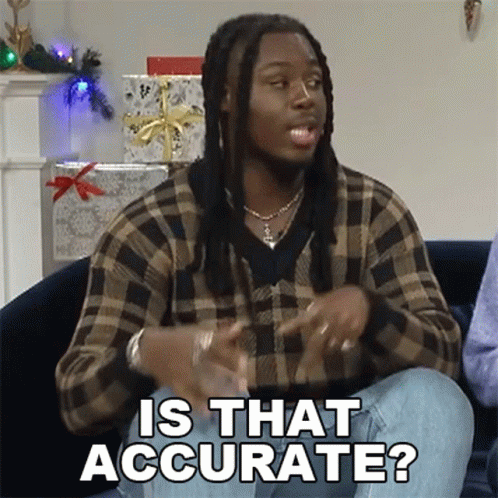 Dreadlocked Man Sitting On Couch Asking Is That Accurate GIF
