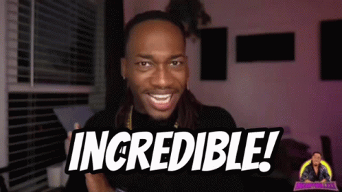 A Man With Dreadlocks Is Smiling And Holding A Sign That Says Incredible GIF
