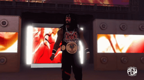A Man With Dreadlocks Is Standing In Front Of A Screen That Says Pgm On It GIF