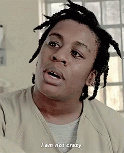 A Man With Dreadlocks Is Talking And Saying I Am Not Crazy . GIF