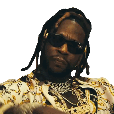 a man with dreadlocks is wearing sunglasses and a necklace with the letter h on it