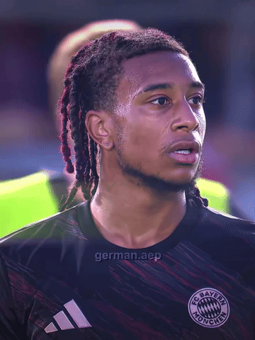 A Man With Dreadlocks Wears A Fc Bayern Munich Jersey GIF