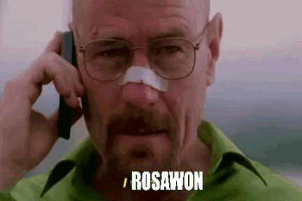 A Man With Glasses And A Bandage On His Nose Is Talking On A Cell Phone And Saying Rosawon . GIF