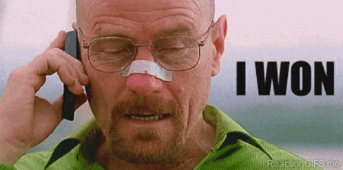 A Man With Glasses And A Bandage On His Nose Is Talking On A Cell Phone And Says I Won GIF
