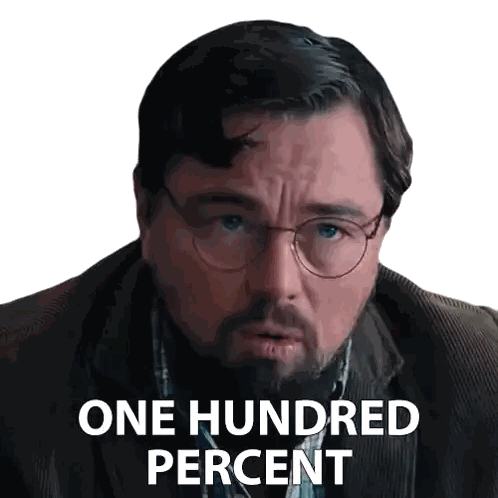 a man with glasses and a beard has one hundred percent written on his face