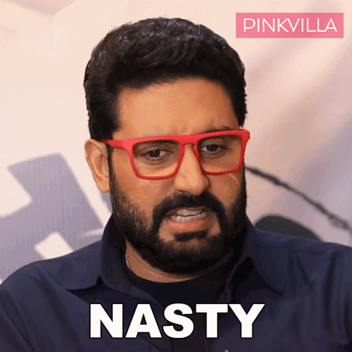 A Man With Glasses And A Beard Has The Word Nasty Written On His Face GIF