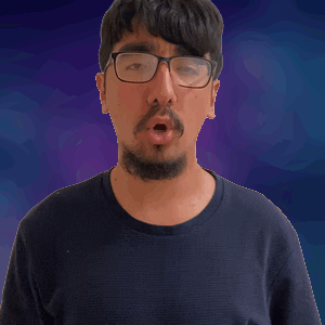 A Man With Glasses And A Beard Is Making A Surprised Face GIF
