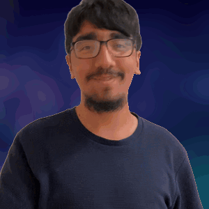 A Man With Glasses And A Beard Is Pointing At Something GIF