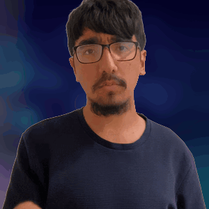 a man with glasses and a beard is pointing his finger
