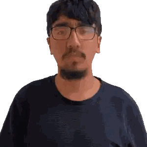 a man with glasses and a beard is wearing a blue shirt
