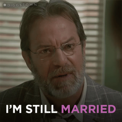 A Man With Glasses And A Beard Says That He Is Still Married GIF