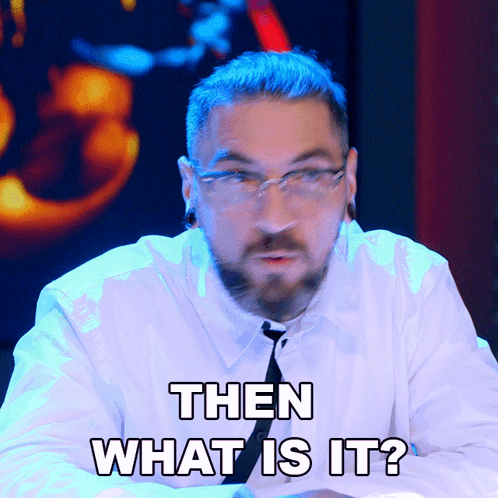 A Man With Glasses And A Beard Says " Then What Is It " GIF